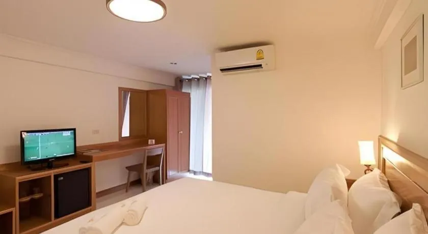 Bed in Muanmanee Boutique Hotel