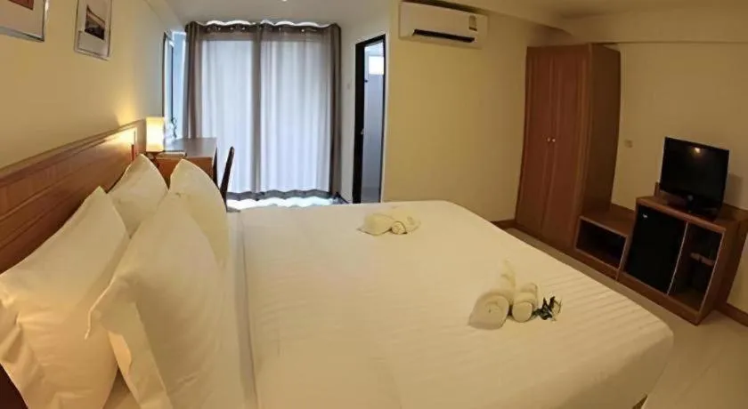 Bed in Muanmanee Boutique Hotel