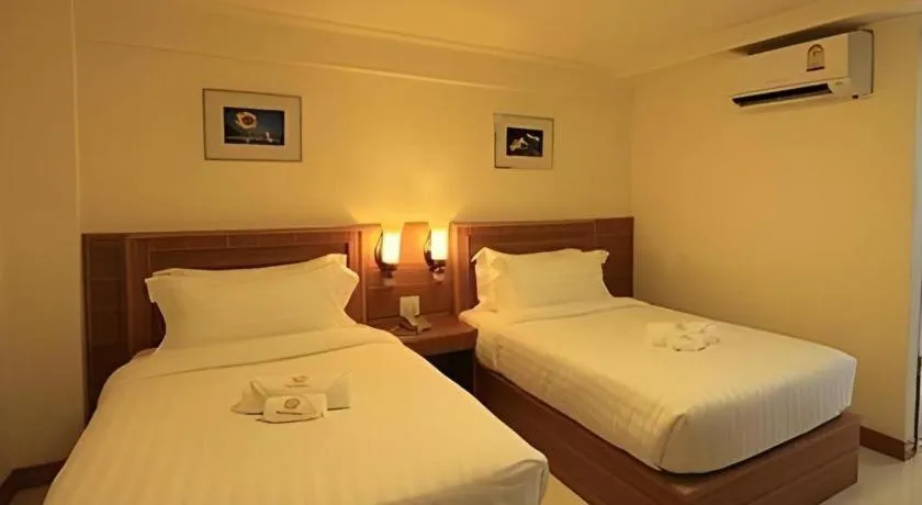 Bed in Muanmanee Boutique Hotel