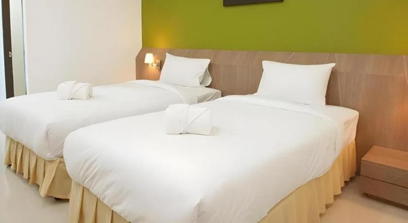 Bed in Soontree House Hotel