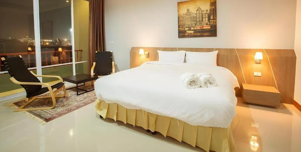 Bed in Soontree House Hotel