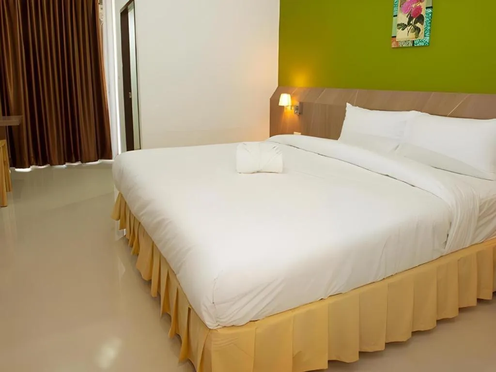 Bed in Soontree House Hotel