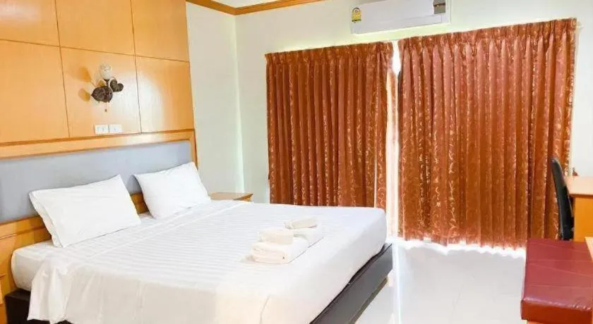 Bed in Siamtara Palace Hotel