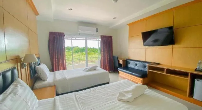 Bed in Siamtara Palace Hotel