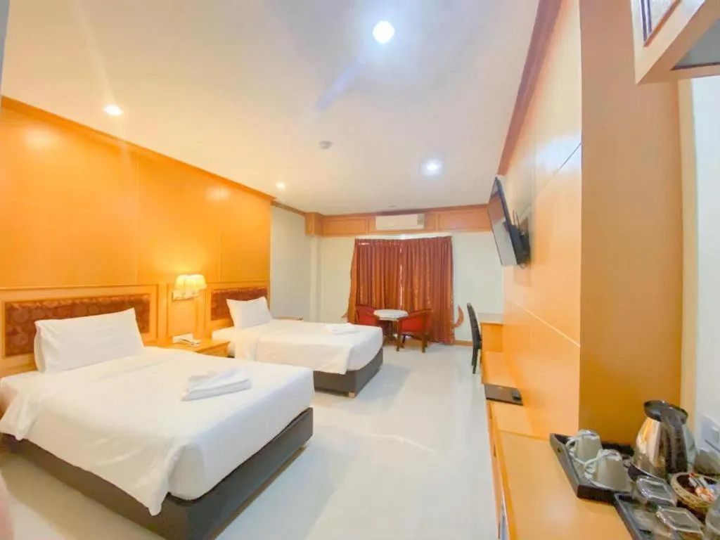 Bed in Siamtara Palace Hotel