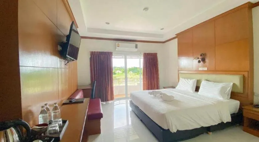 Bed in Siamtara Palace Hotel