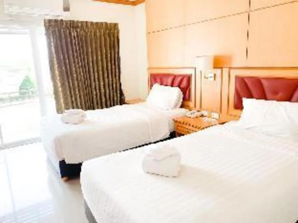 Bed in Siamtara Palace Hotel