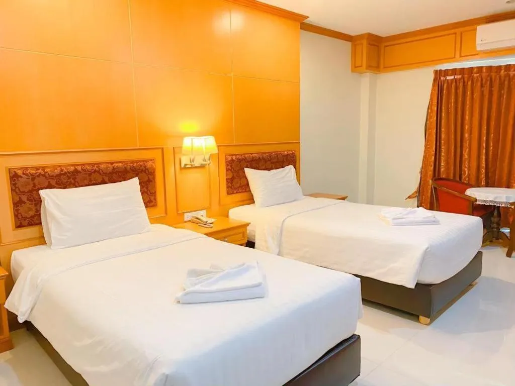 Bed in Siamtara Palace Hotel