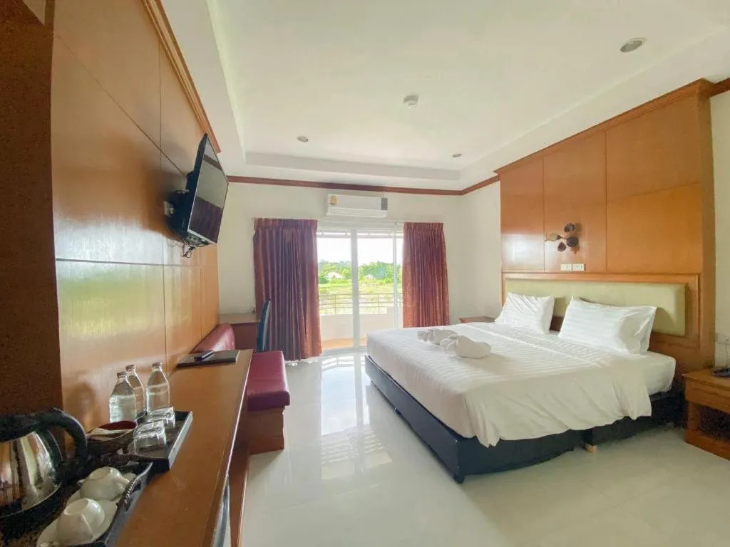 Bed in Siamtara Palace Hotel