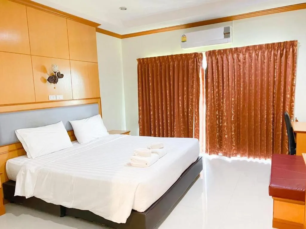 Bed in Siamtara Palace Hotel