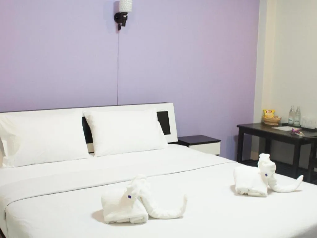 Bed in Nan Treasure Hotel