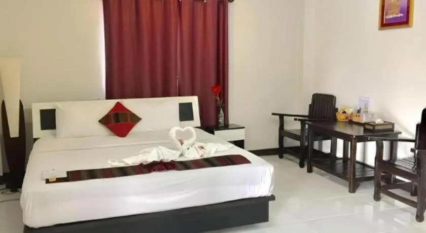 Bed in Nan Treasure Hotel