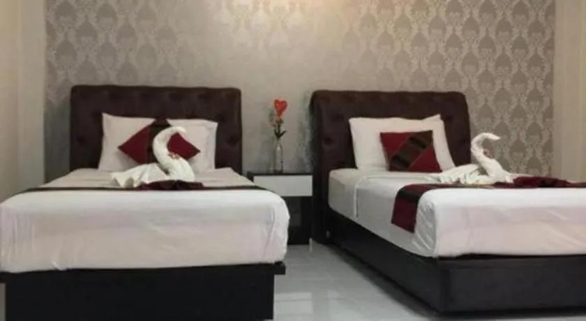 Bed in Nan Treasure Hotel