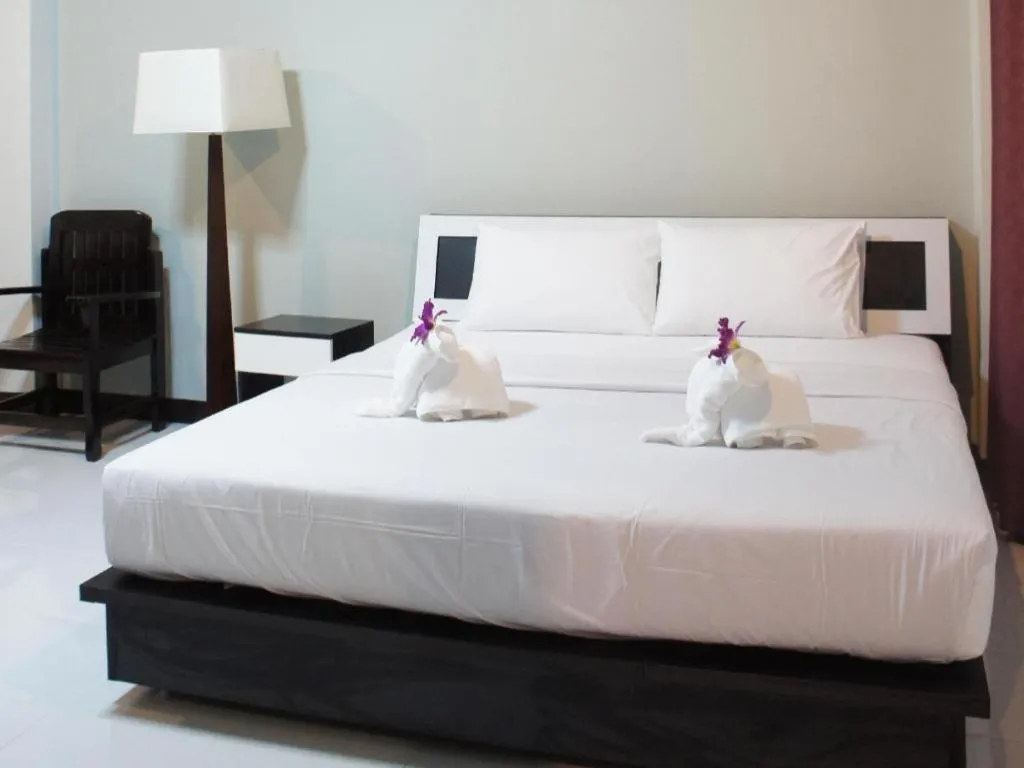 Bed in Nan Treasure Hotel