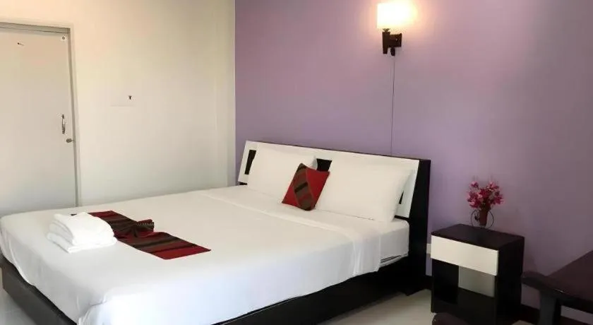 Bed in Nan Treasure Hotel