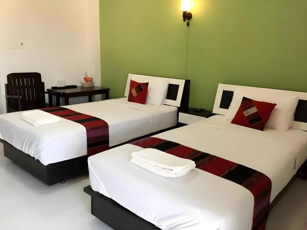 Bed in Nan Treasure Hotel