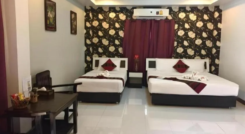 Bed in Nan Treasure Hotel