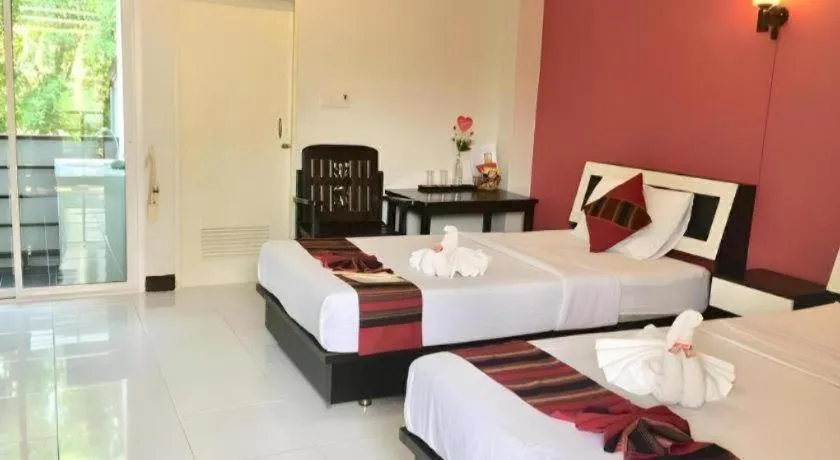 Bed in Nan Treasure Hotel