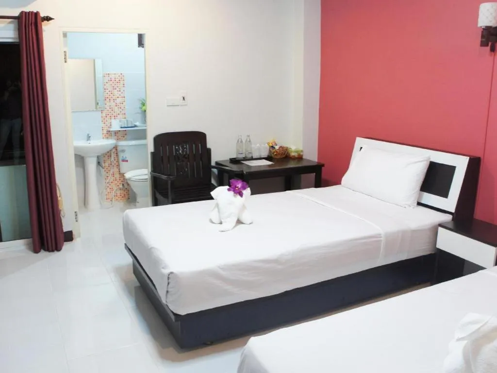 Bed in Nan Treasure Hotel