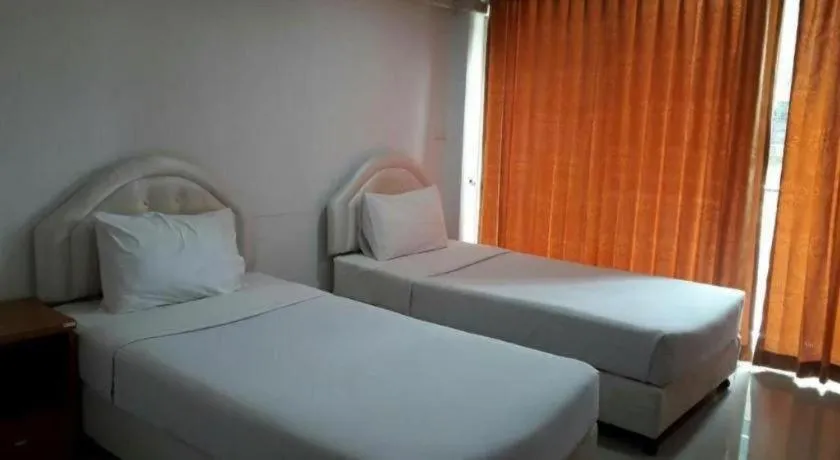 Bed in Phetsuwan Hotel