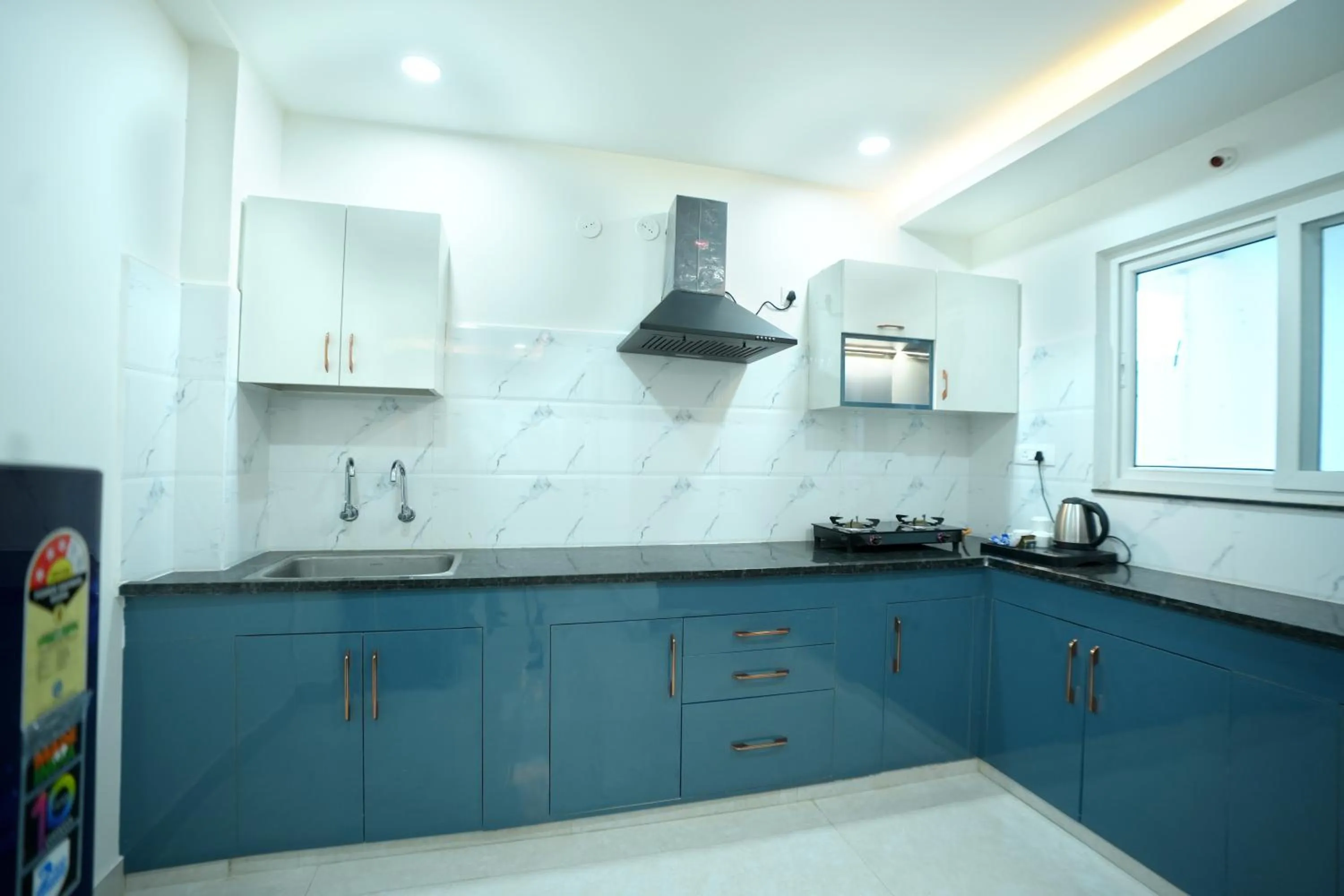 Kitchen or kitchenette in Hotel Viola Suites Madhapur, Business Hotel