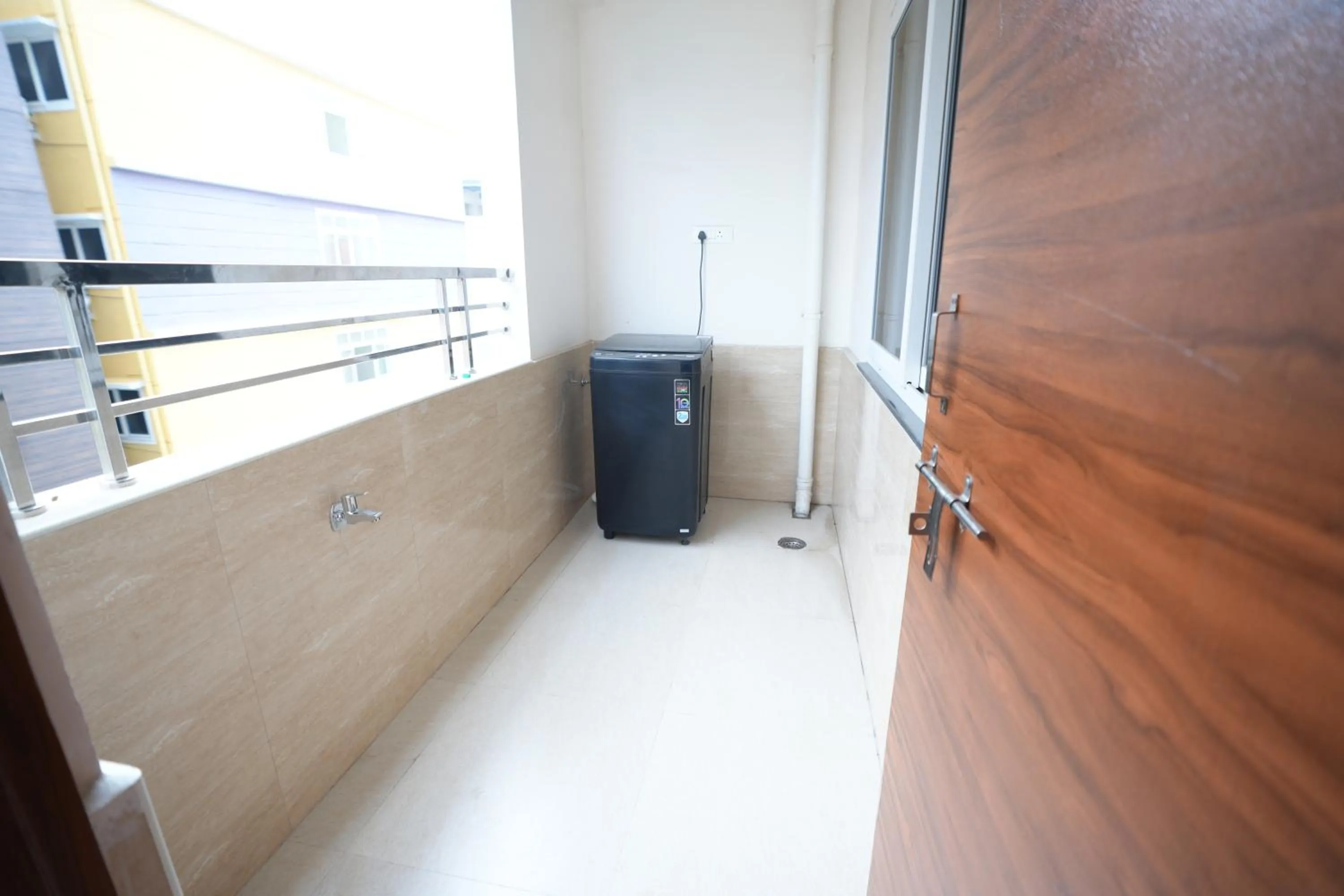 washing machine in Hotel Viola Suites Madhapur, Business Hotel