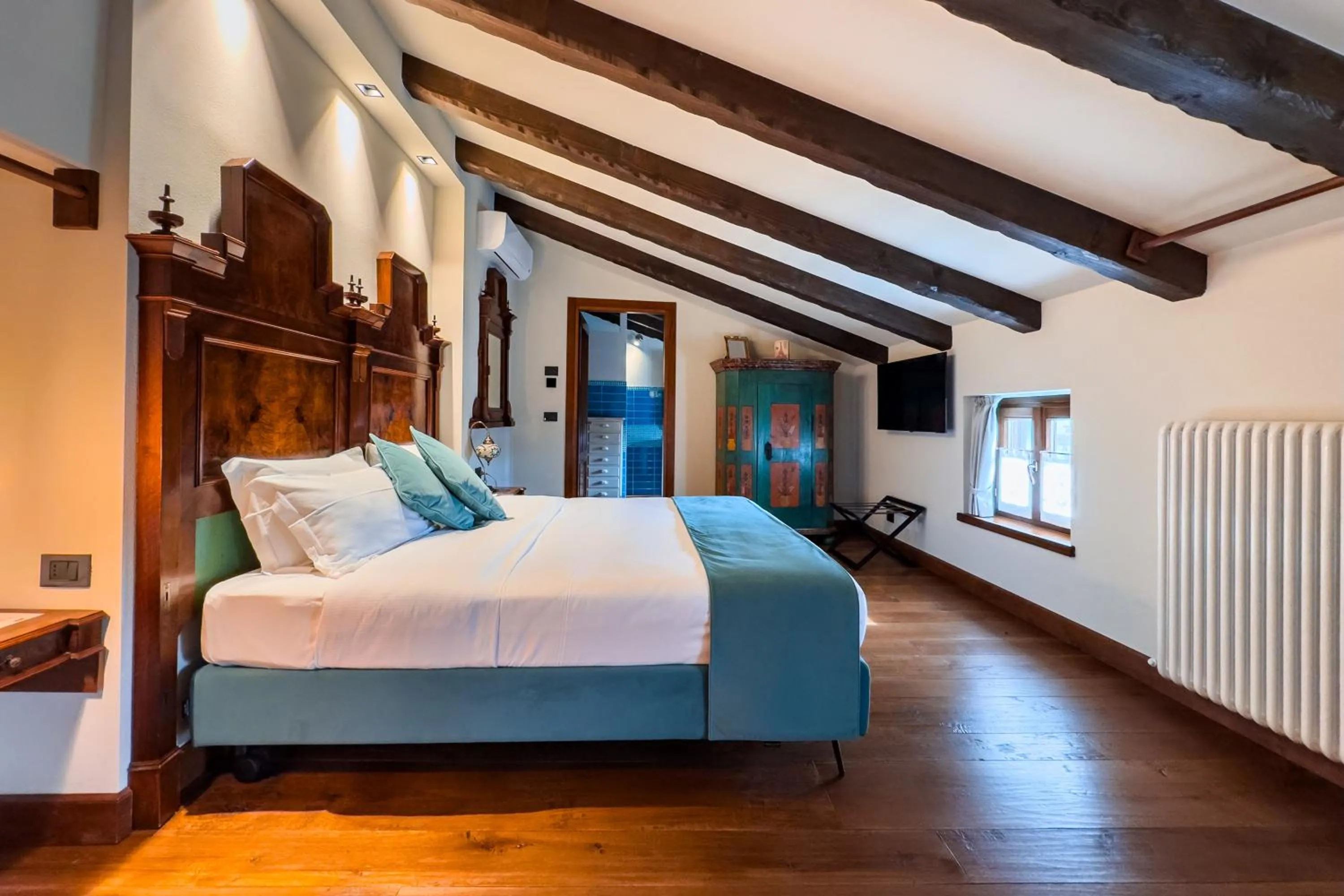 Photo of the whole room, Bed in 1448 Antica Dimora Al Merlo Bianco