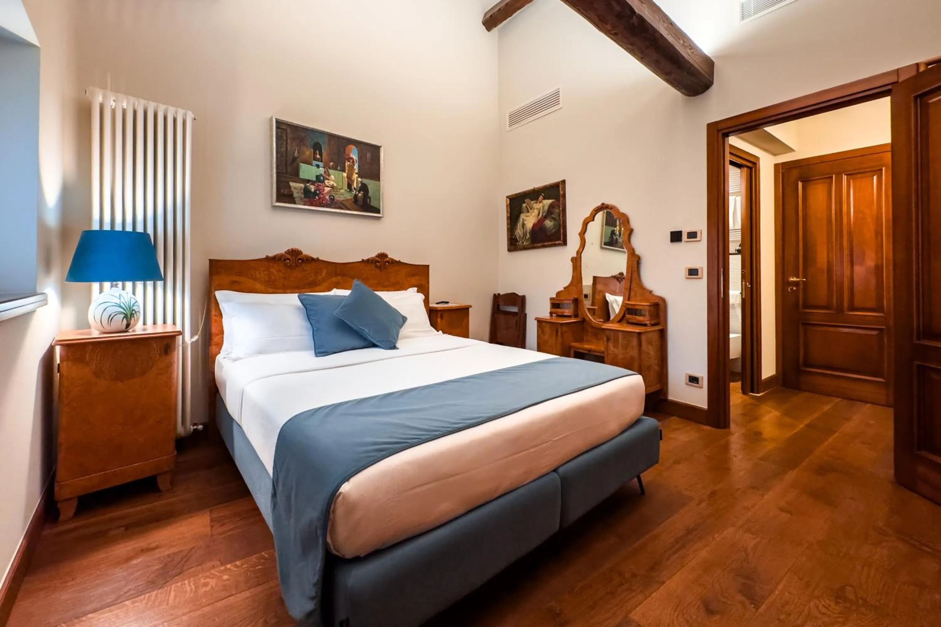 Bed in 1448 Antica Dimora Al Merlo Bianco