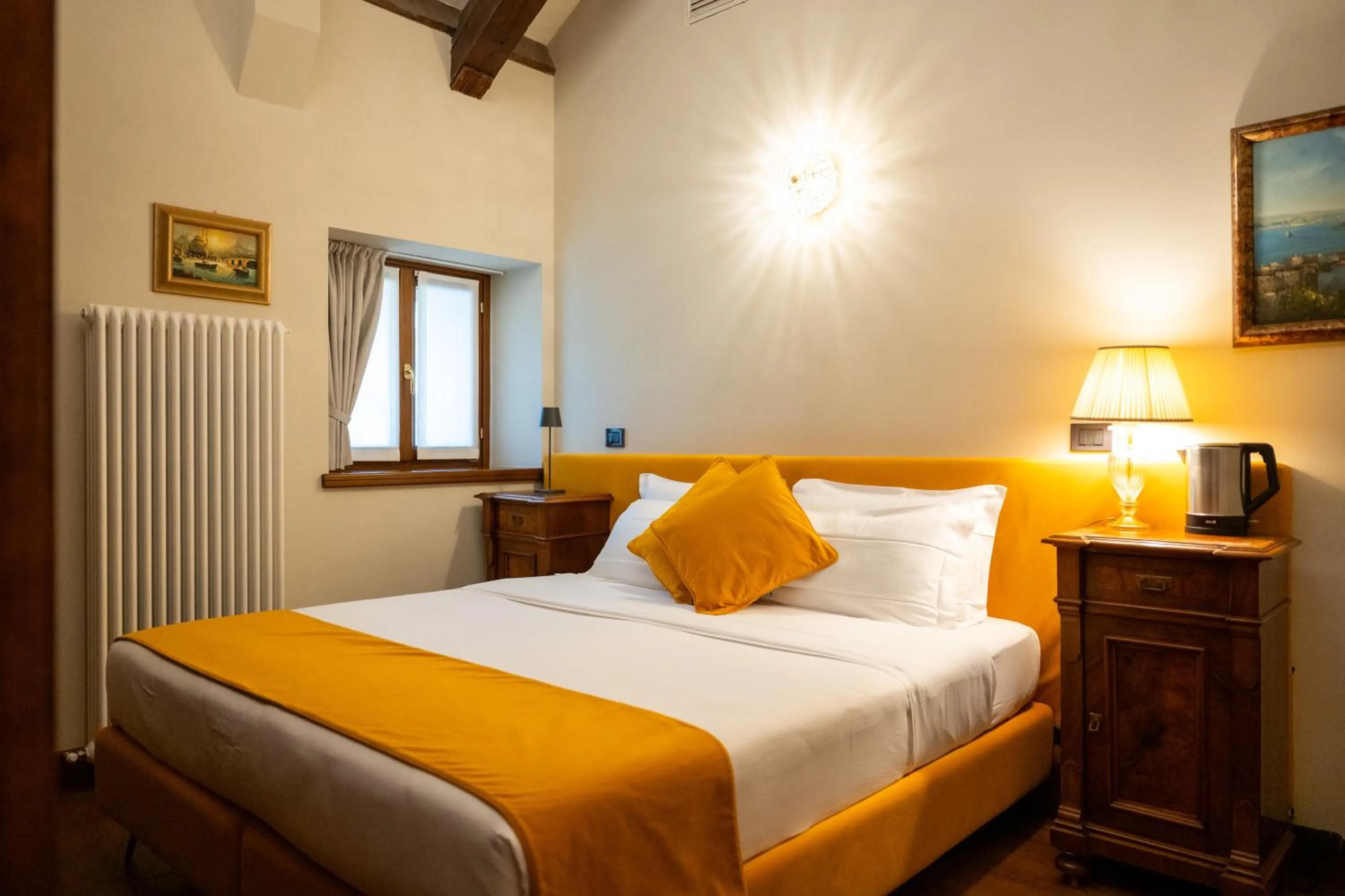 Photo of the whole room, Bed in 1448 Antica Dimora Al Merlo Bianco