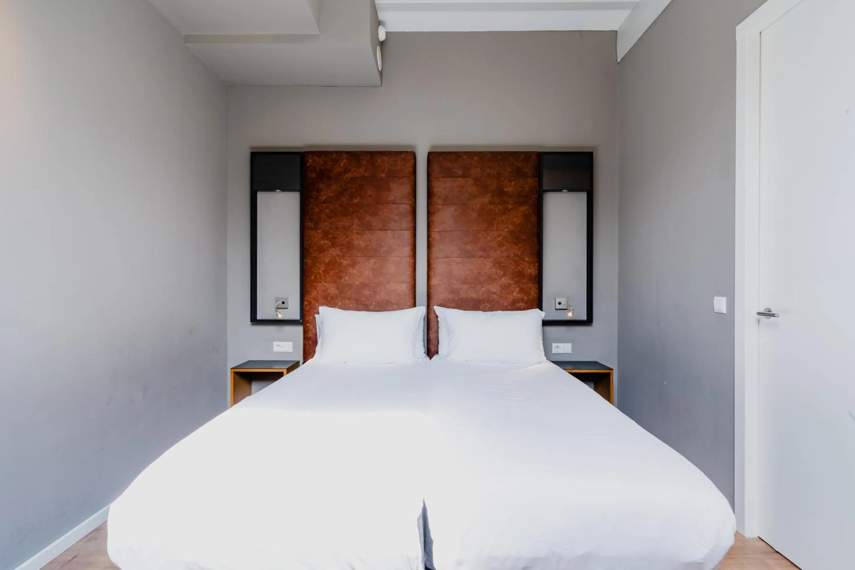 Bed in Apartments De Hallen