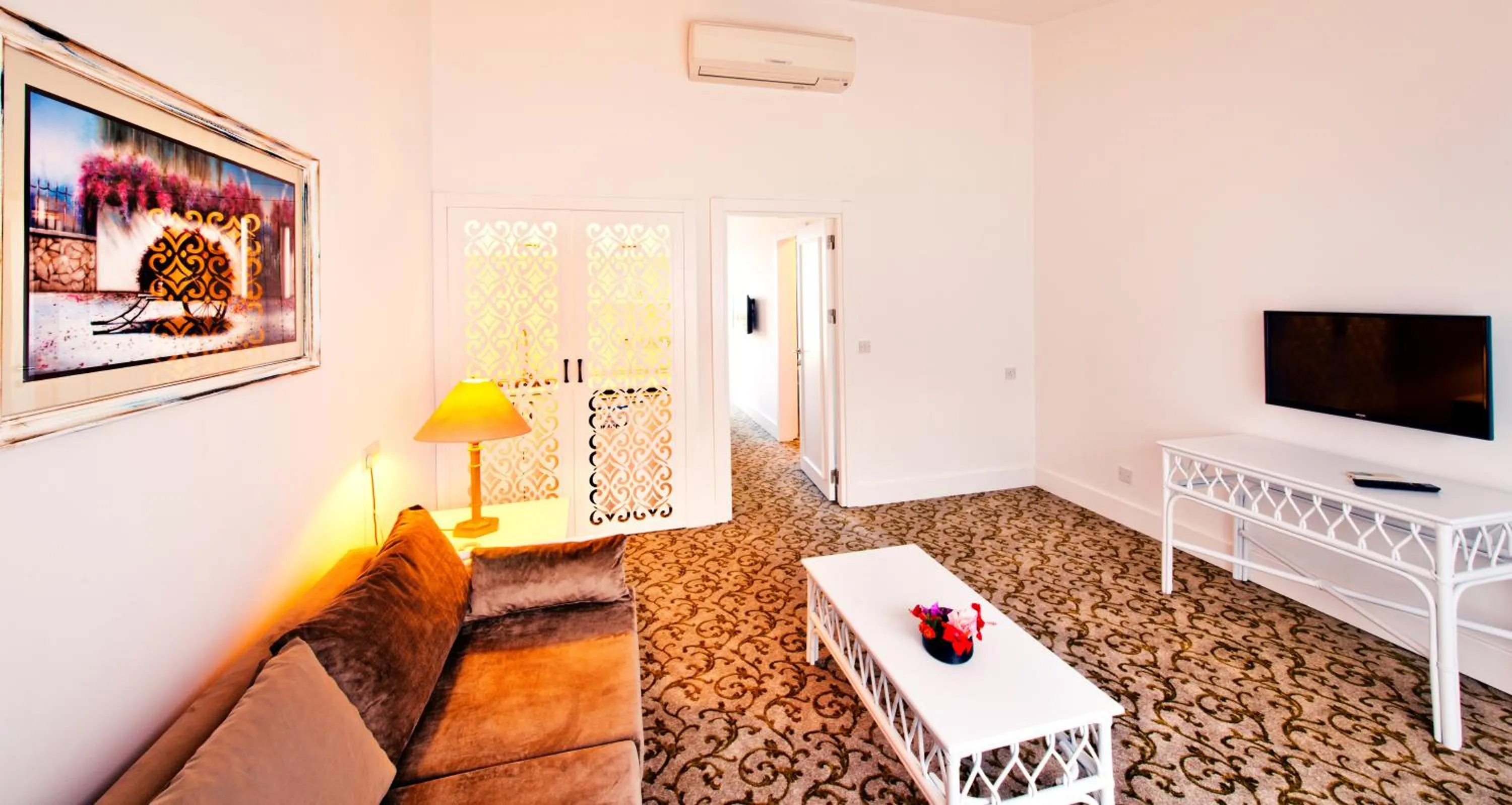 Living room, Bed in The Olive Tree Hotel