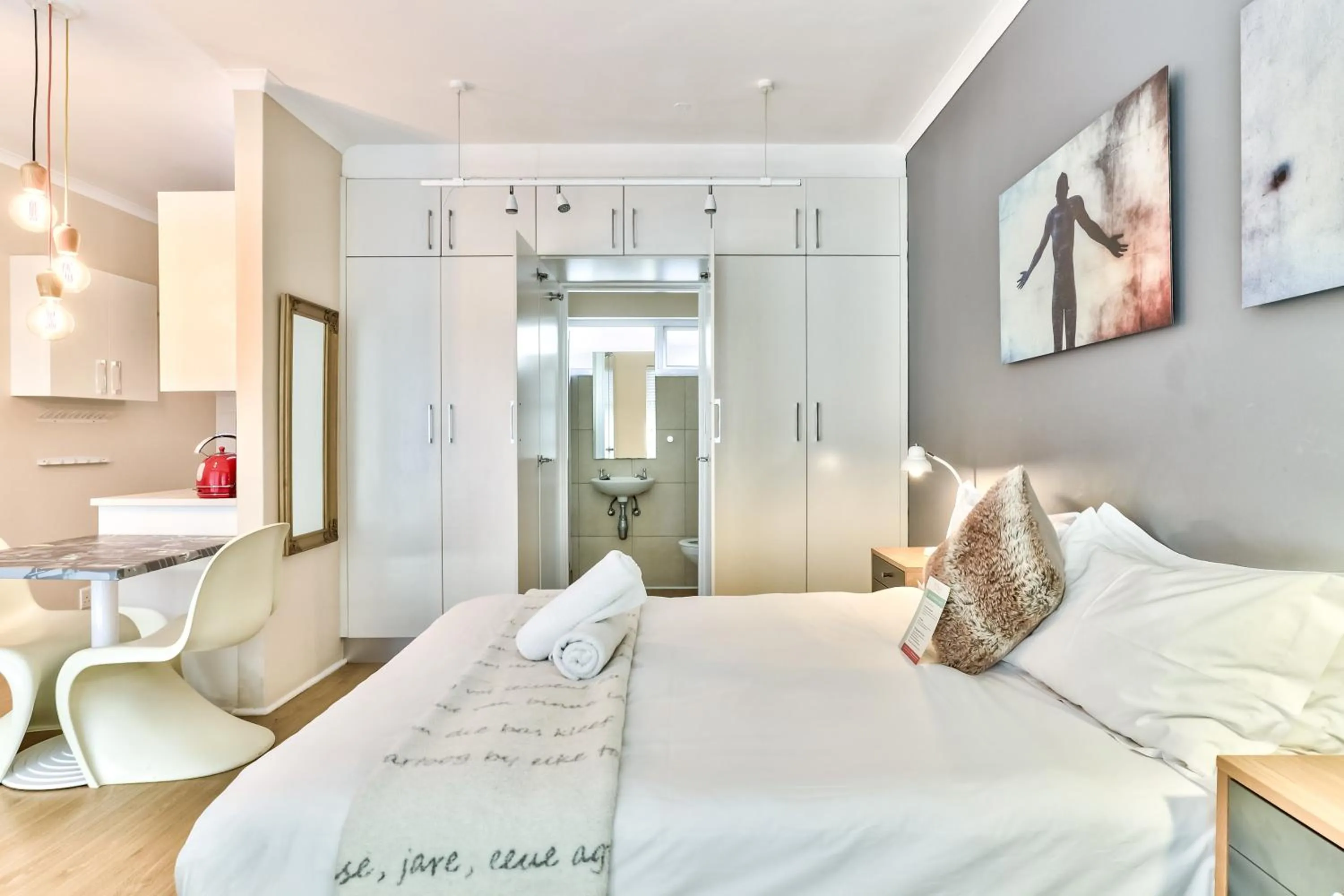 Bed in WINK Aparthotel Quiver Tree