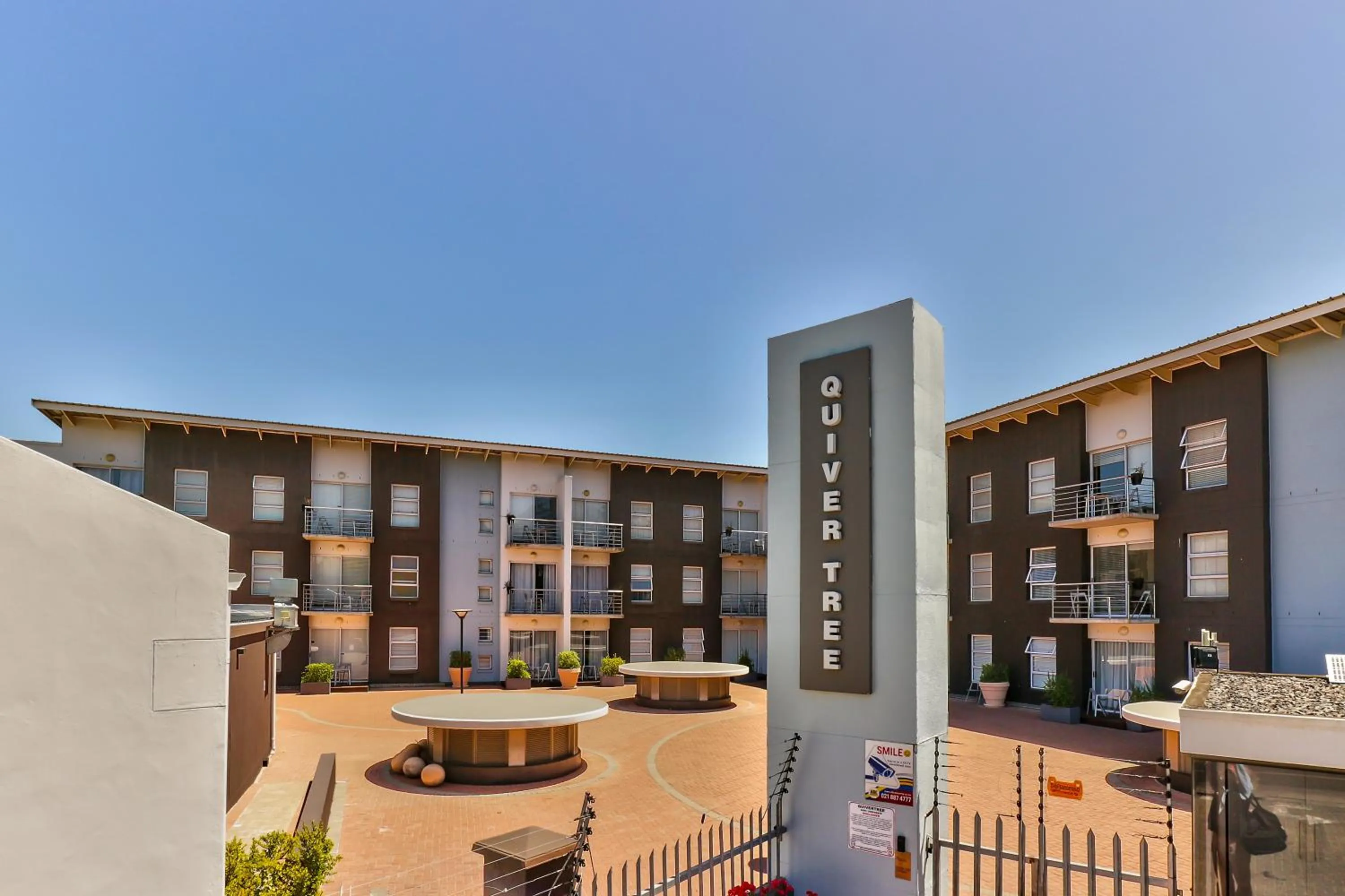 Property building in WINK Aparthotel Quiver Tree