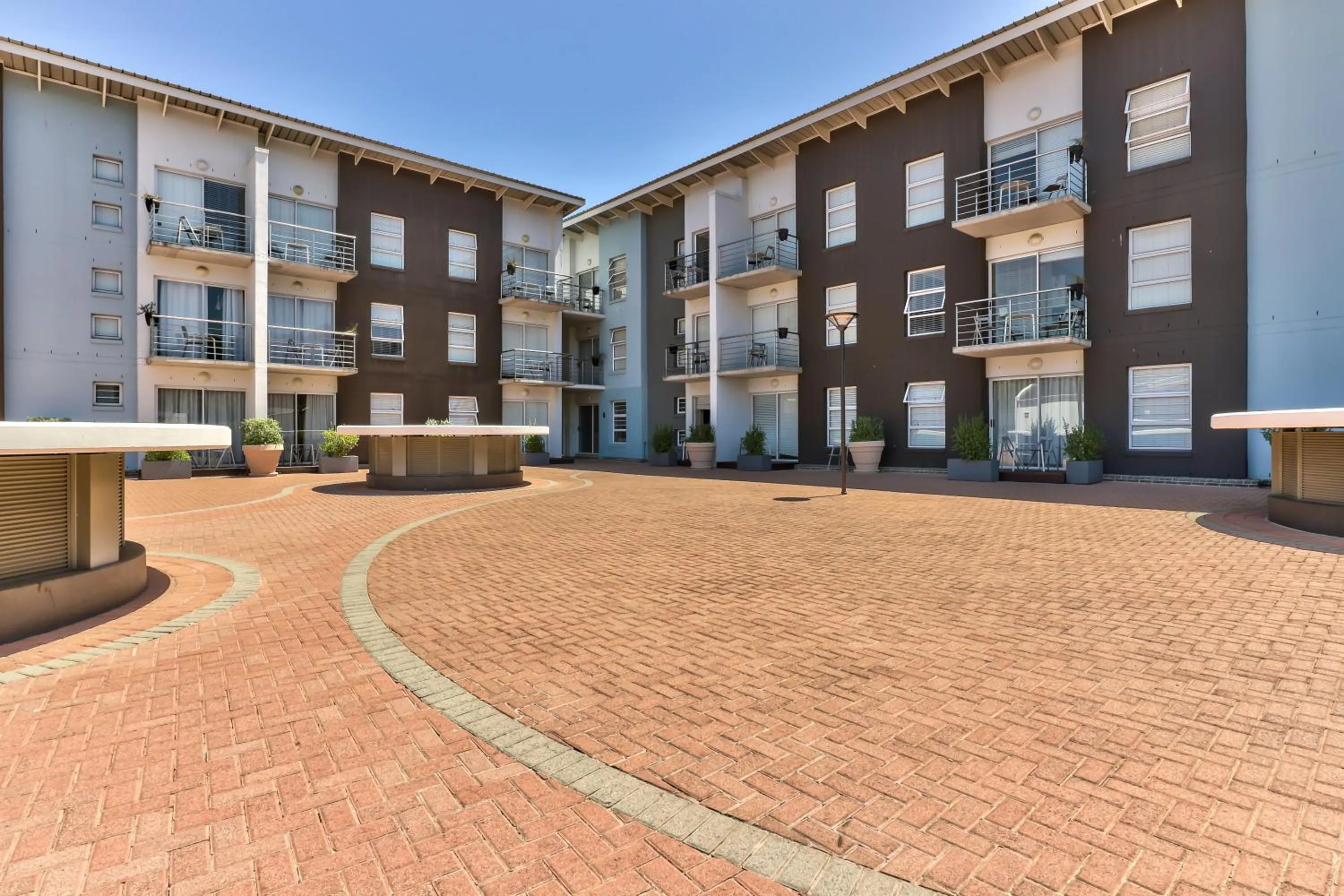 Property building in WINK Aparthotel Quiver Tree