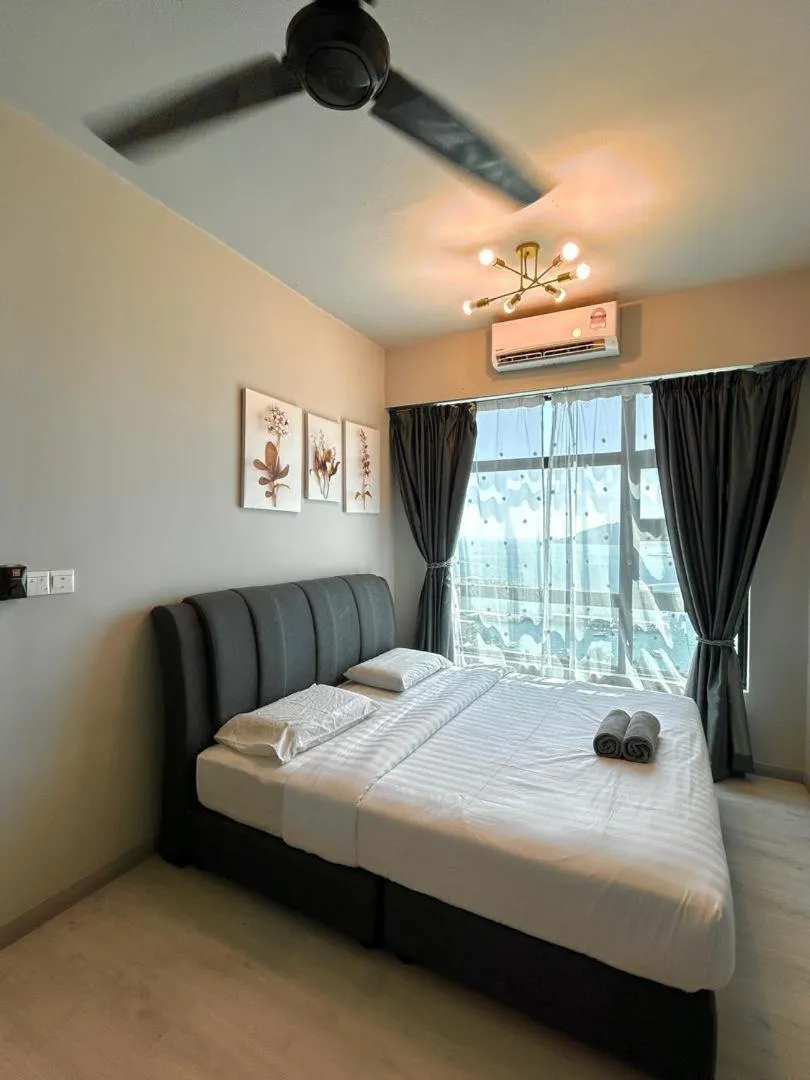 Bed in Jesselton Quay Kota Kinabalu City Centre by LW Suites
