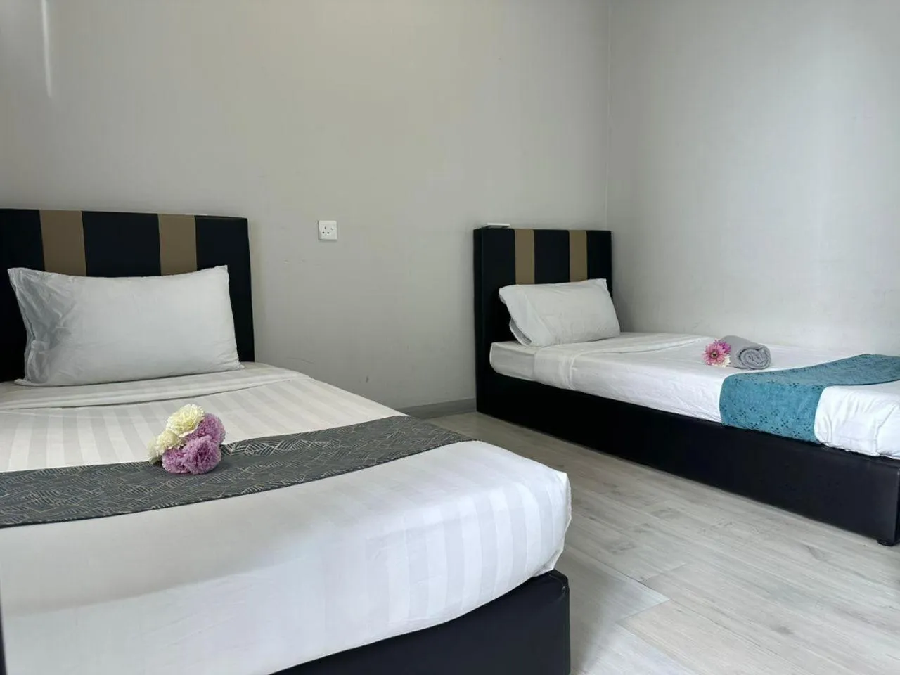 Bed in Jesselton Quay Kota Kinabalu City Centre by LW Suites