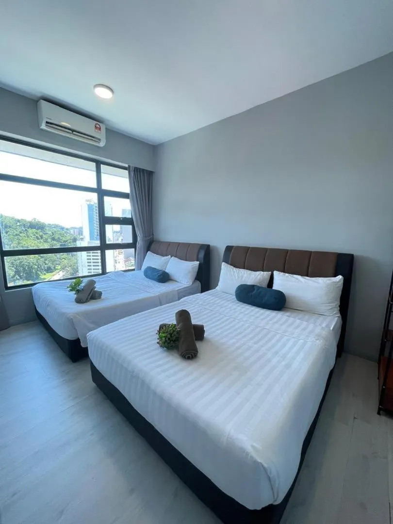 Bed in Jesselton Quay Kota Kinabalu City Centre by LW Suites