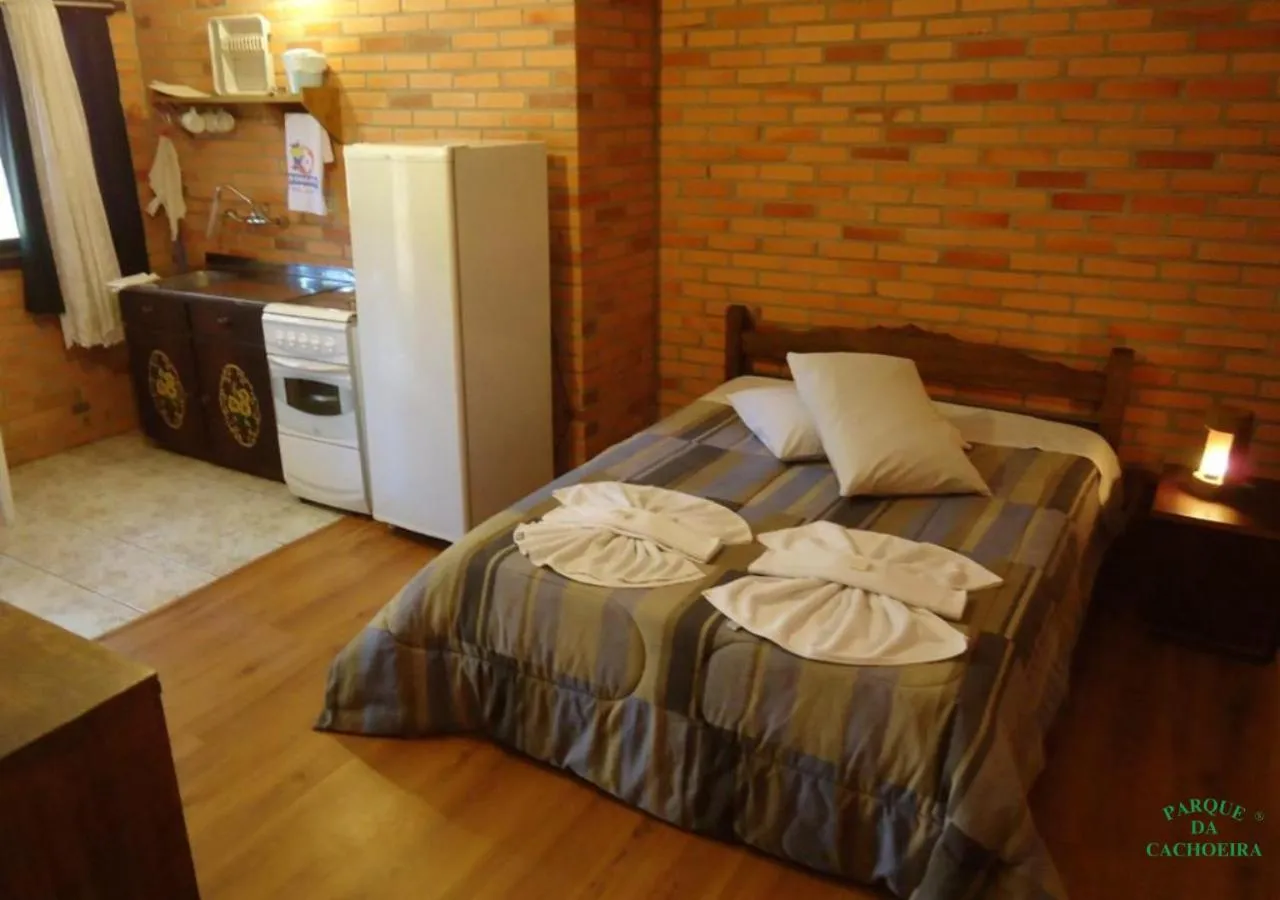 Kitchen or kitchenette, Bed in Parque Da Cachoeira
