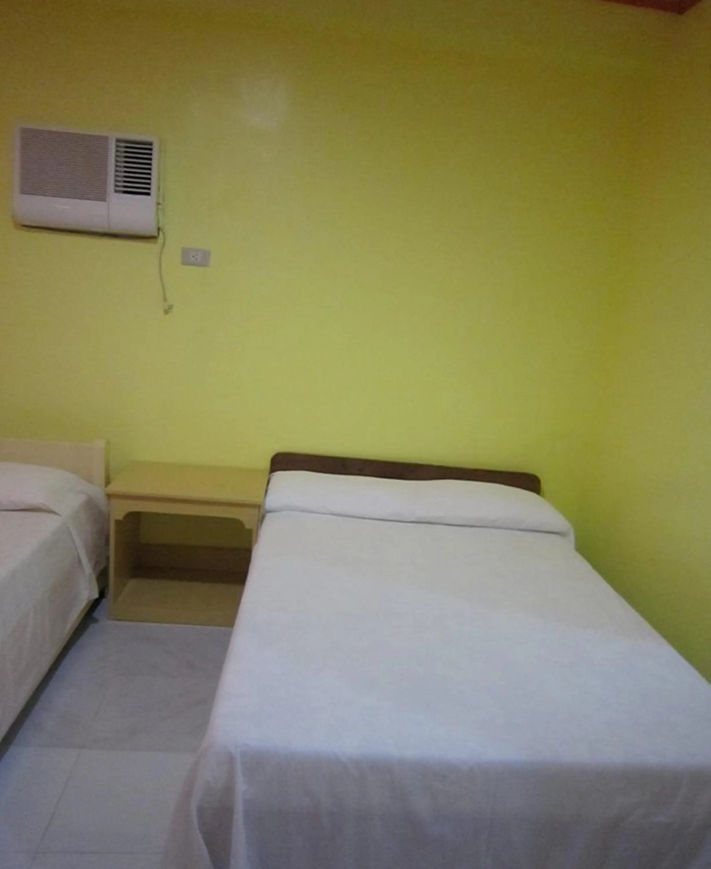 Bed in M&E Guesthouse