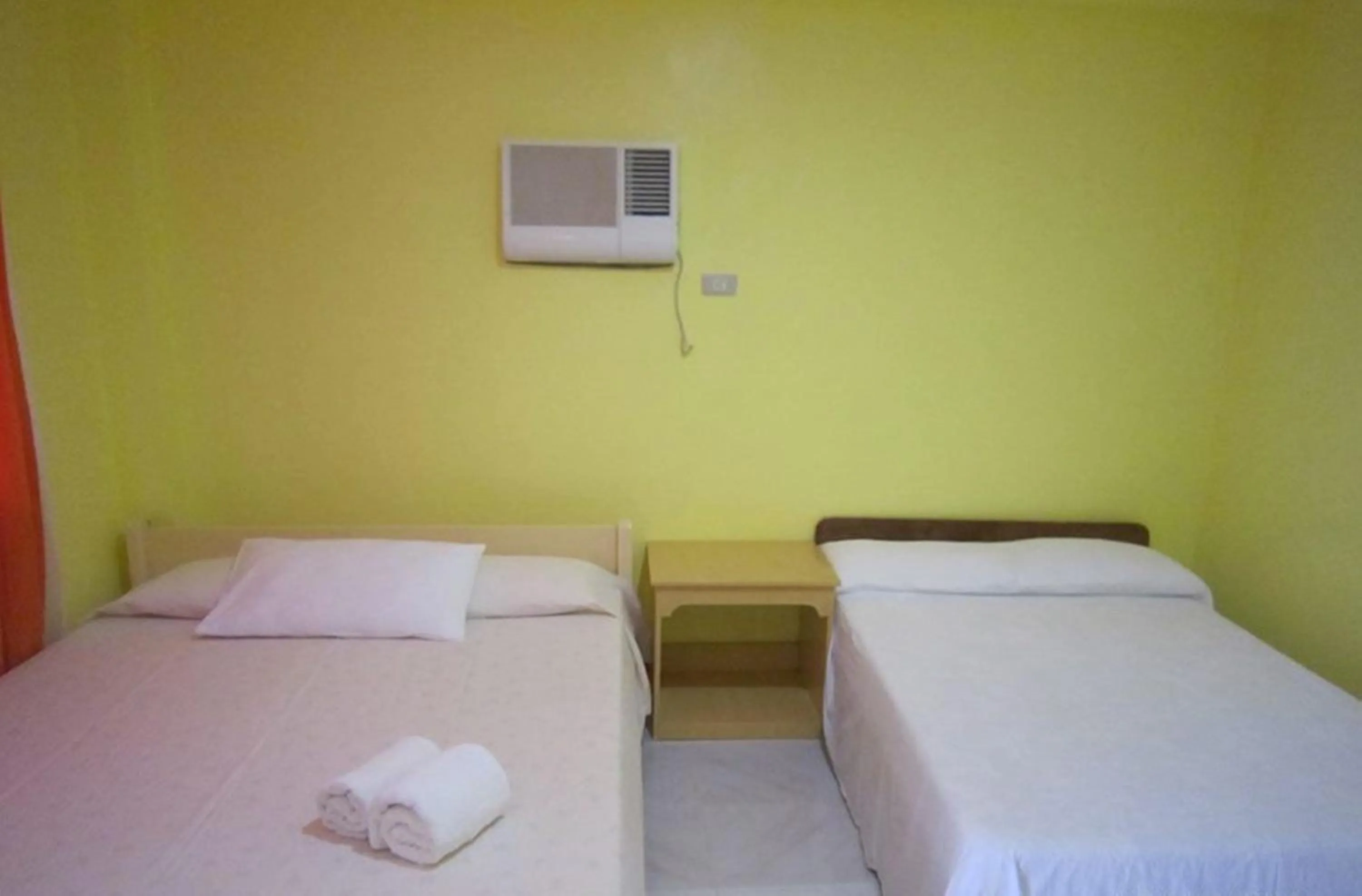 Bed in M&E Guesthouse