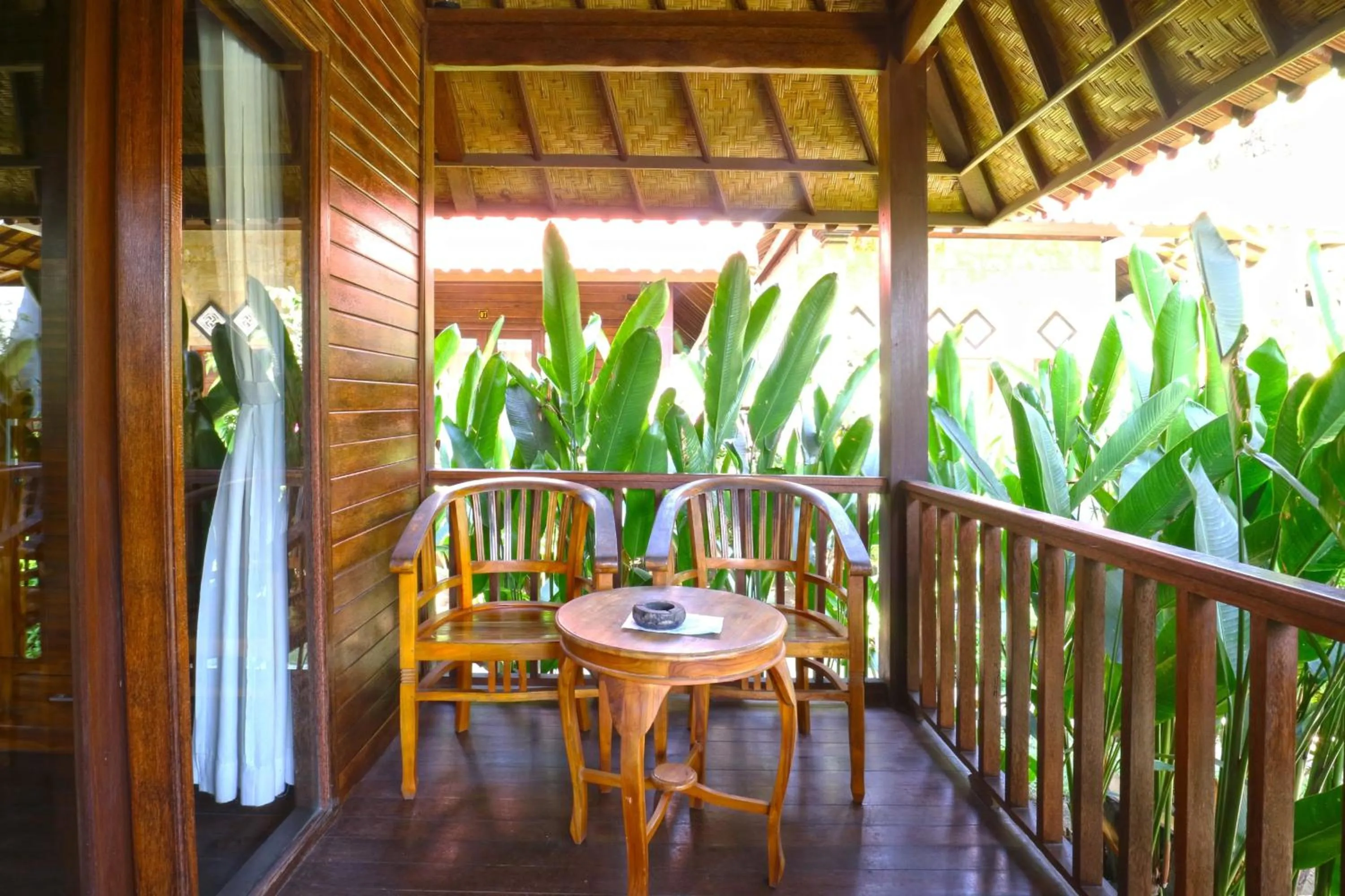 Balcony/Terrace in Nyoman Guesthouse and Grill
