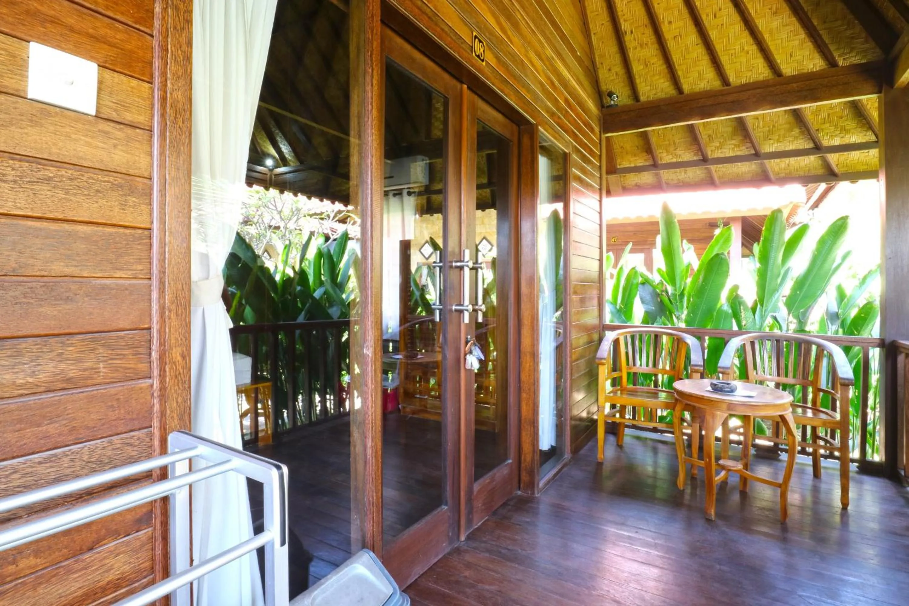 Property building in Nyoman Guesthouse and Grill
