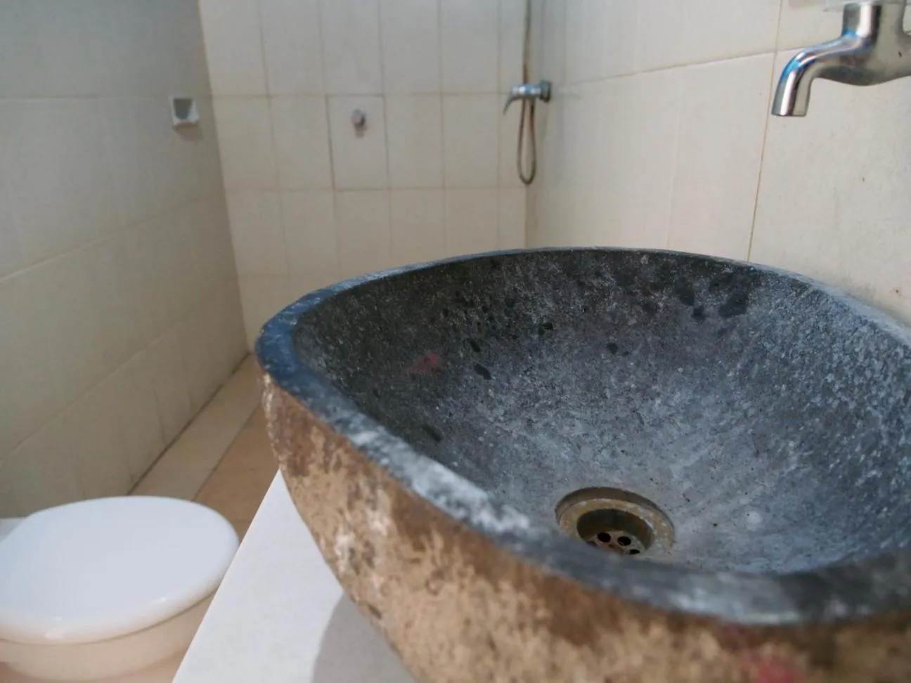 Bathroom in Nyoman Guesthouse and Grill