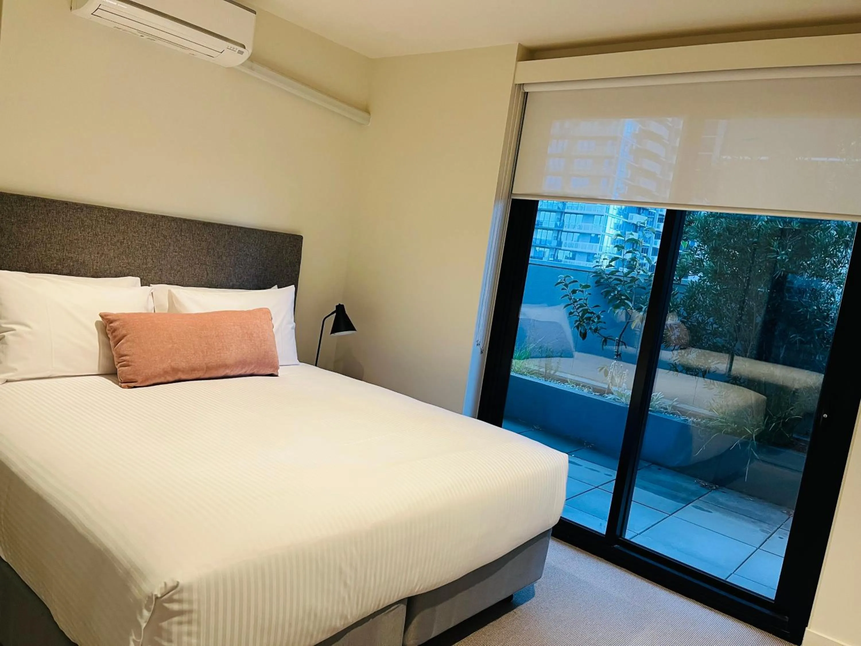 Bed in Wyndham Hotel Melbourne