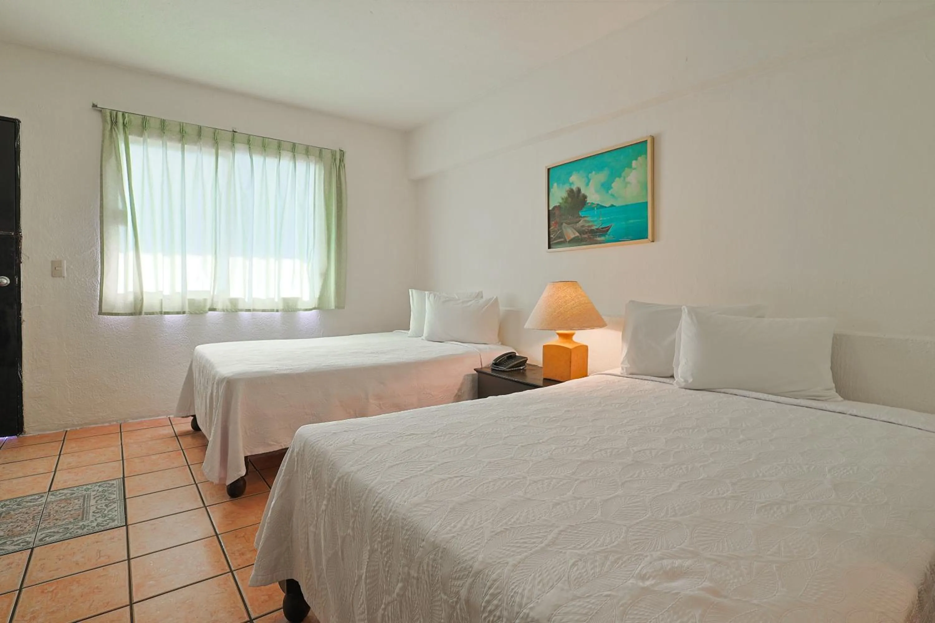 Bed in Hotel Delfín Vista Pier Beach Front