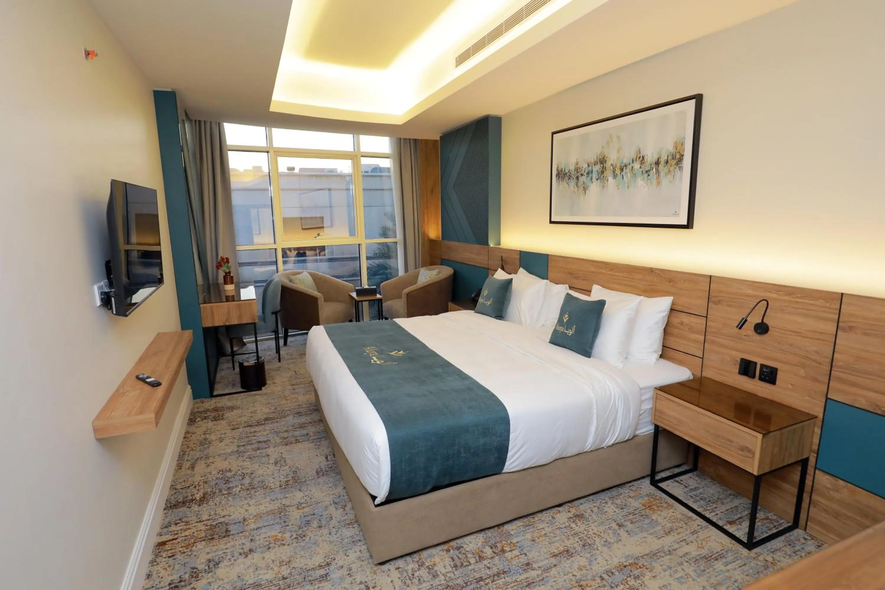 Living room, Bed in Aluya Hotel