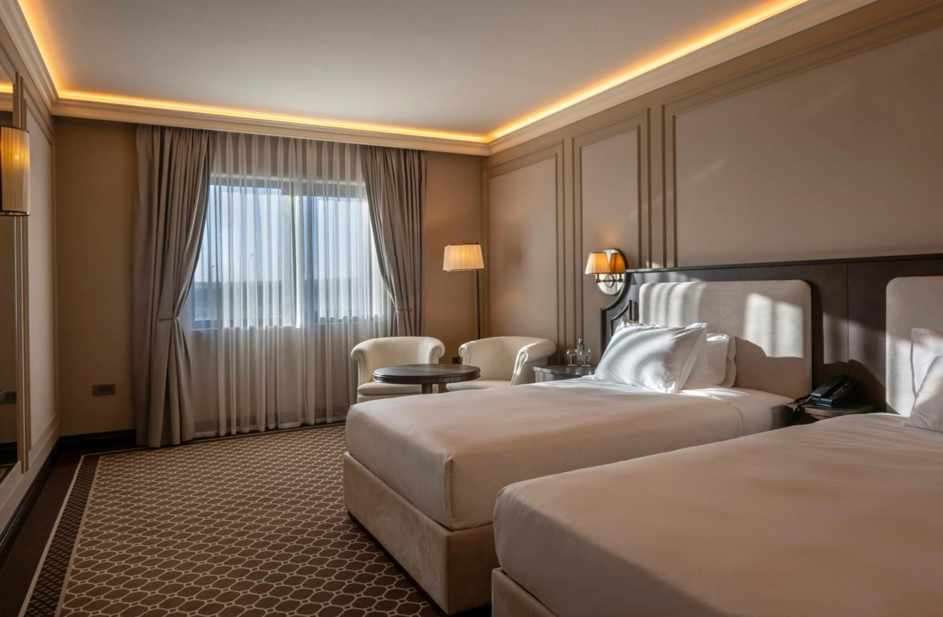 Bed in GoldenEye Hotel & Casino