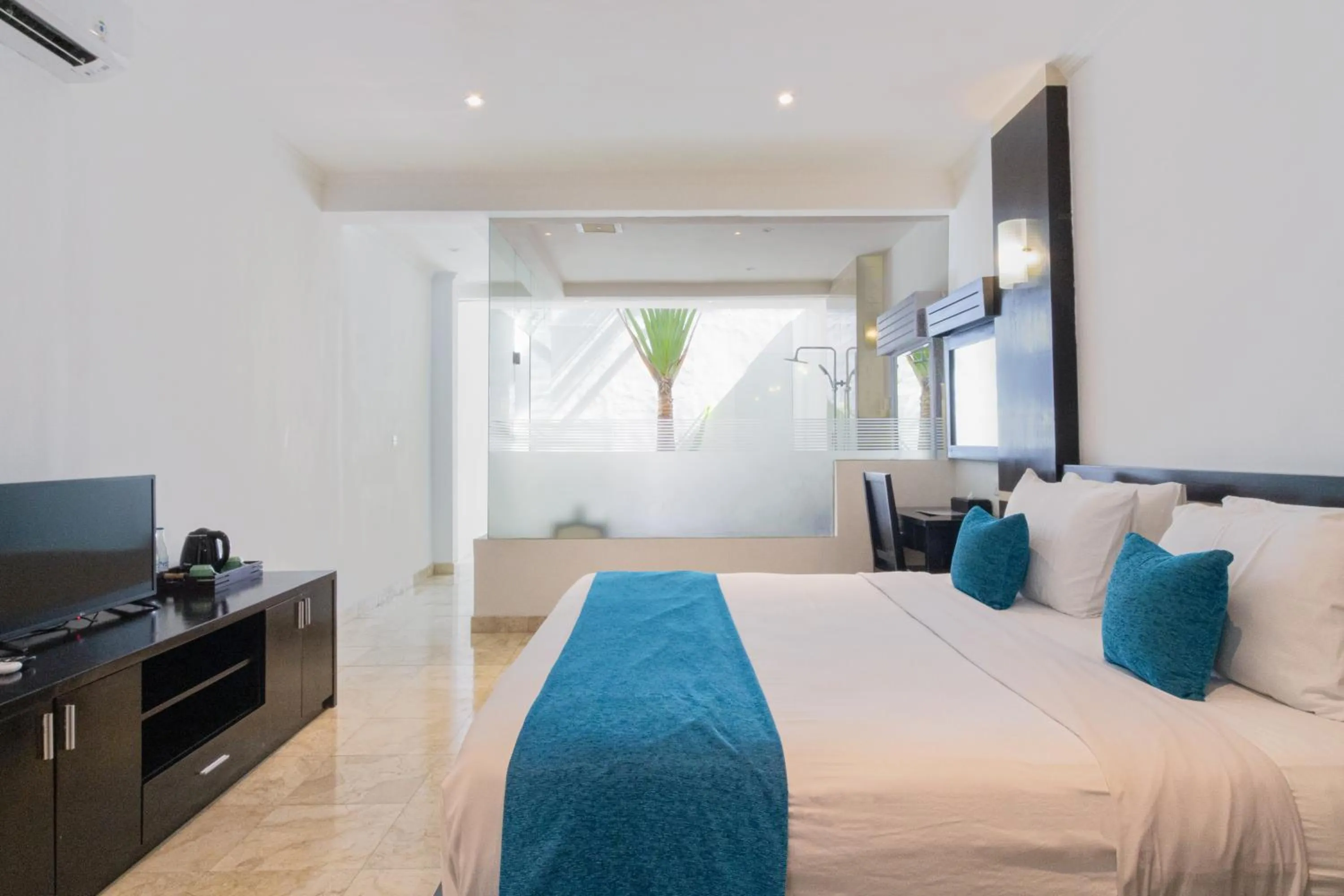 Bed in Blue Point Resort and Spa