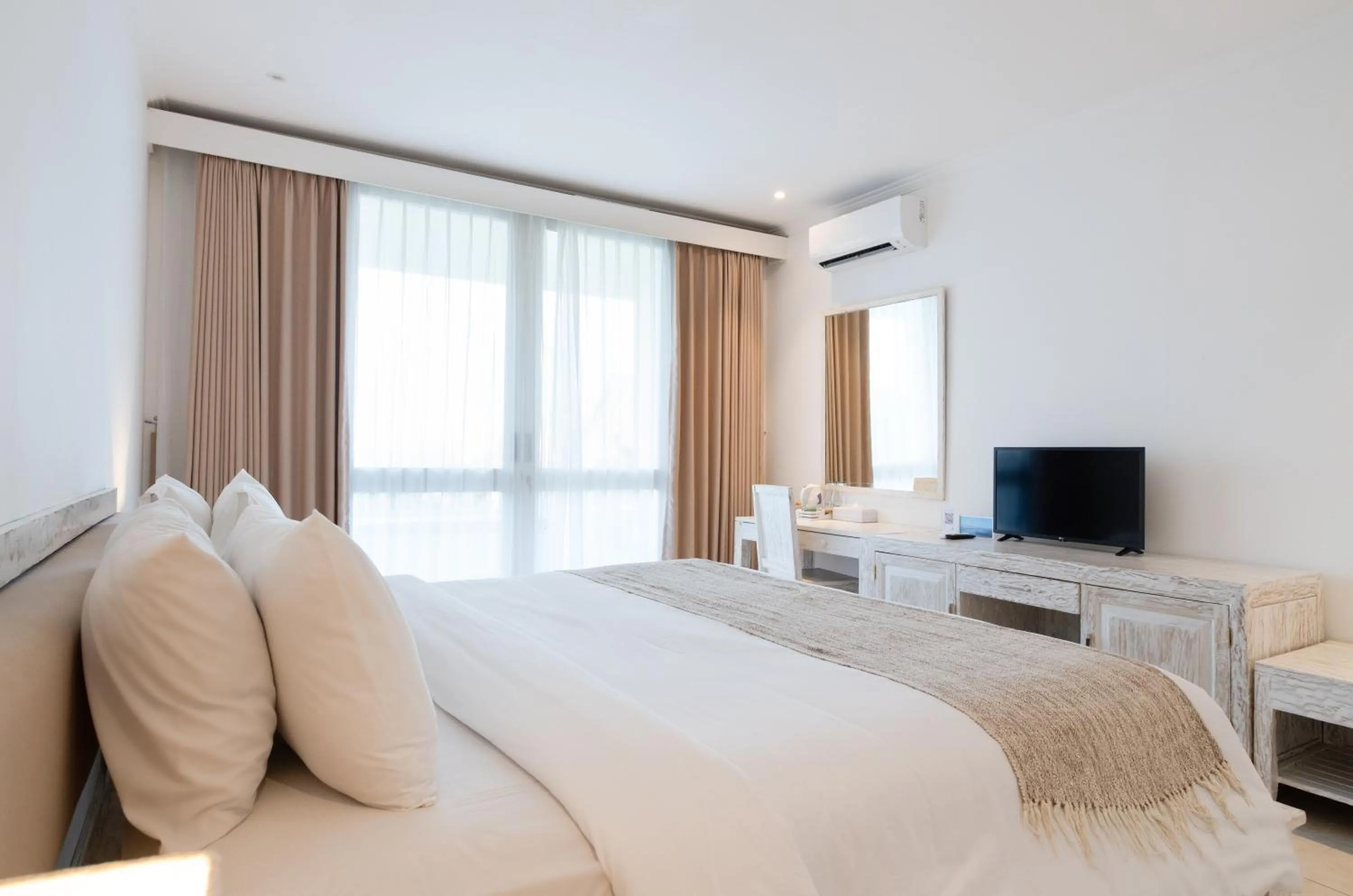 Bed in Blue Point Resort and Spa