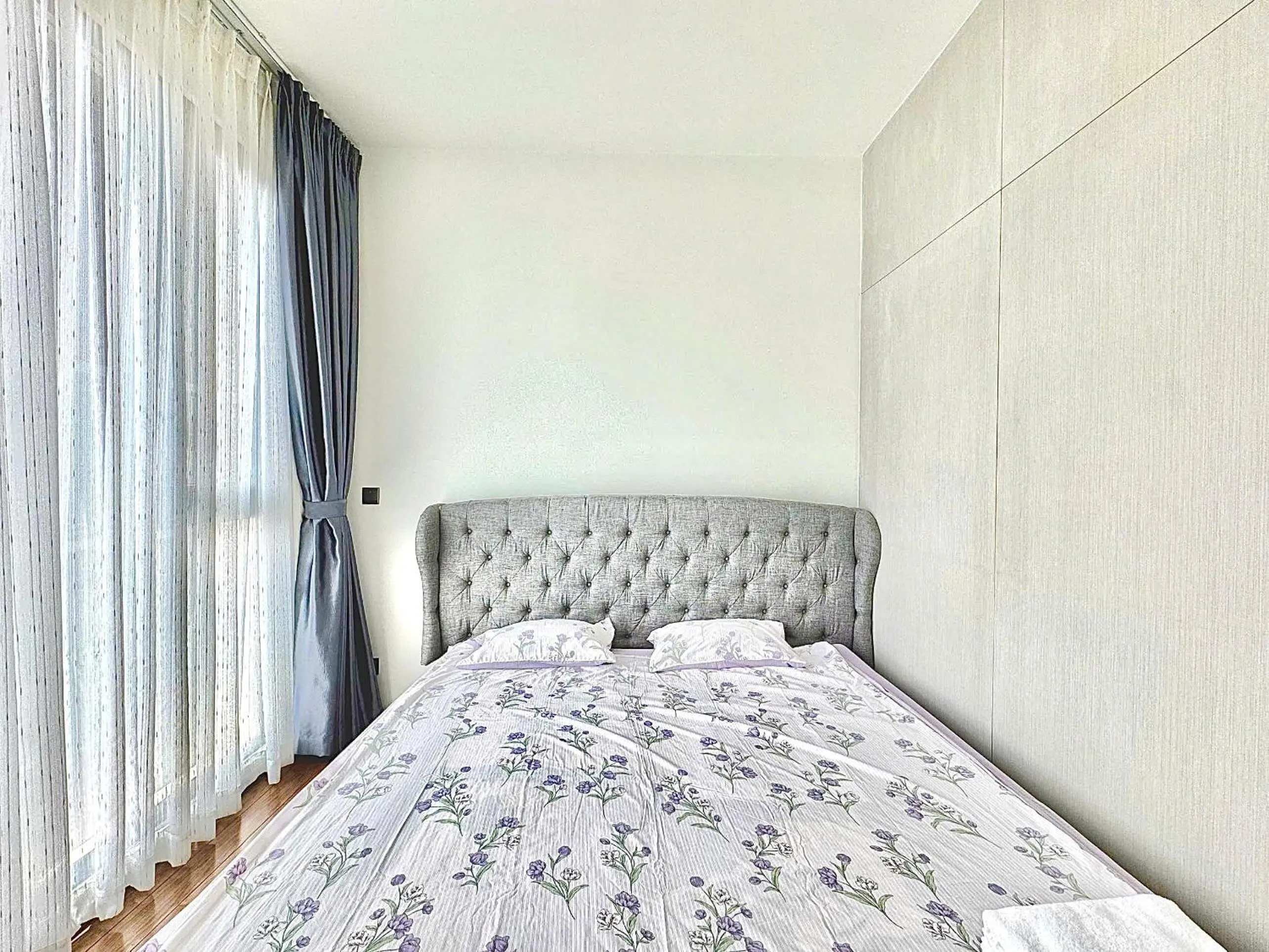 Bed in Homie's Dedge Thao Dien Luxury Apartment